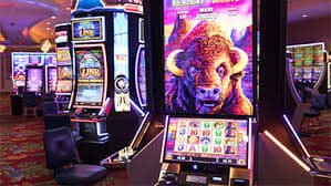 Mobile phone showing vipslot99 login blackjack table with betting controls and live dealer
